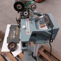 Constant heat sealer on foot with date stamper
