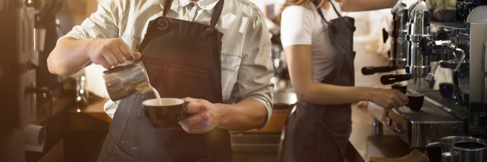 Baristas Working in Cafe